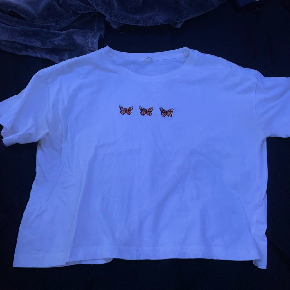 White butterfly shirt sleeve. Barely worn